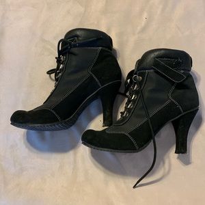 Black lace up high heel boots